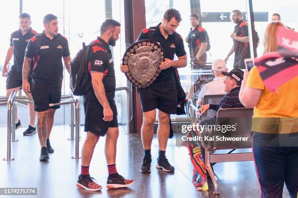 Head Coach Joe Maddock and captain Luke Whitelock of Canterbury arrive home with the Ranfurly Shield at Christchurch Airport on October 06, 2019 in...