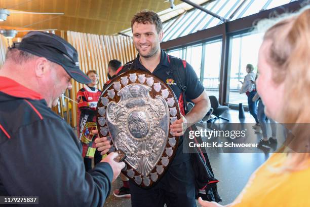 Captain Luke Whitelock of Canterbury arrives home with the Ranfurly Shield at Christchurch Airport on October 06, 2019 in Christchurch, New Zealand....