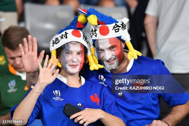 France rugby fans pose prior to the Japan 2019 Rugby World Cup bronze final match between New Zealand and Wales at the Tokyo Stadium in Tokyo on...