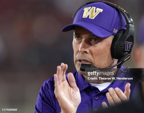 Head coach Chris Petersen of the Washington Huskies looks on from the sidelines against the Stanford Cardinal during the second quarter of an NCAA...