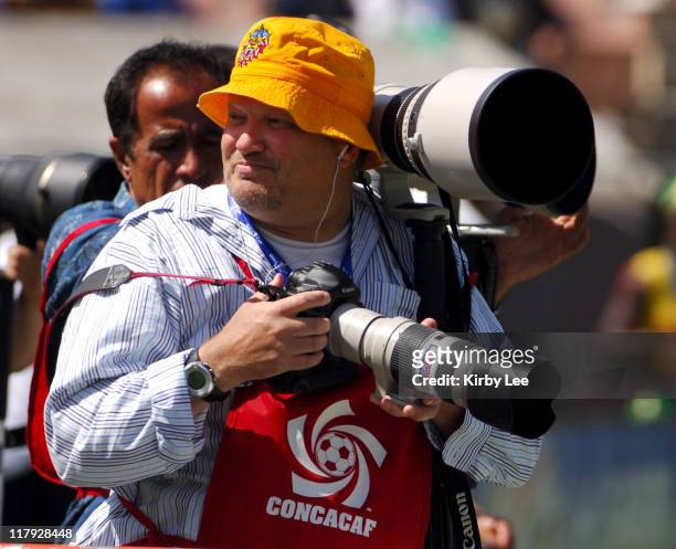 Drew Carey moonlights as a photographer at CONCACAF Gold Cup soccer match between Jamaica and South Africa at the Los Angeles Memorial Coliseum on...