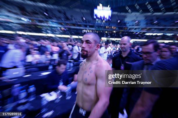 Dejected Robert Whittaker leaves Marvel Stadium after being defected by Israel Adesanya in their Middleweight title bout during UFC 243 at Marvel...