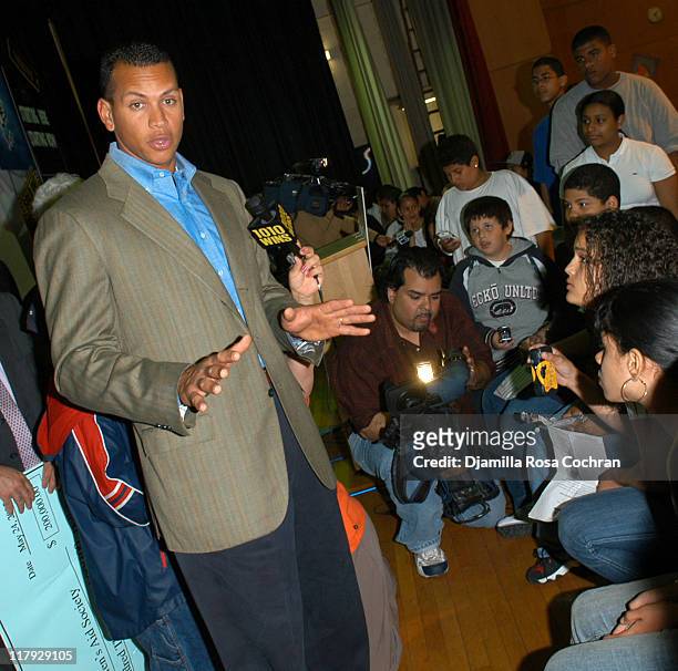 Alex Rodriguez with children during Alex Rodriguez and Cynthia Rodriguez Donate $200,000 to The Children's Aid Society at Salome Urena Middle...