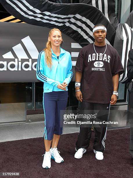 Anna Kournikova and Sebastian Telfair during Opening of the World's Largest Adidas Sport Performance Store in the World at Adidas Soho Store in New...