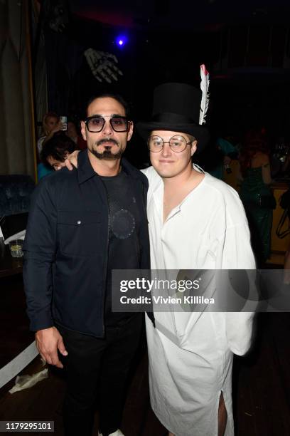 Eric Podwall and Lucas Grabeel attend Podwall Entertainment's 10th Annual Halloween Party presented by Maker's Mark on October 31, 2019 in West...