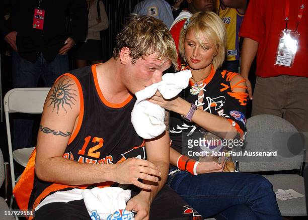 Nick Carter and Paris Hilton during 2004 NBA All-Star Celebrity Game at Los Angeles Convention Center in Los Angeles, California, United States.
