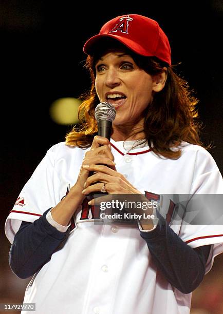 Marilu Henner sings "Take Me Out to the Ball Game" during seventh-inning stretch during Los Angeles Angels of Anaheim game against the Washington...