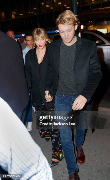 Taylor Swift and Joe Alwyn arrive at Zuma on October 06, 2019 in New York City.