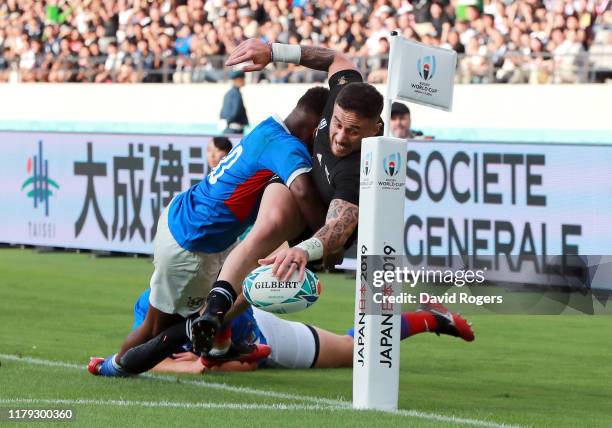 Perenara of New Zealand dives to score his side's eleventh try during the Rugby World Cup 2019 Group B game between New Zealand and Namibia at Tokyo...