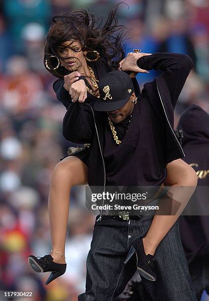 Rihanna performs during the half-time show of the 2006 Brut Sun Bowl contested bewteen Oregon State and Missouri at Sun Bowl Stadium in El Paso,...