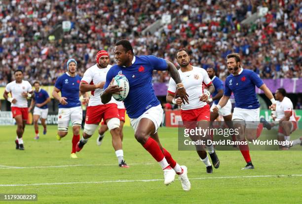 Virimi Vakatawa of France scores his team's first try during the Rugby World Cup 2019 Group C game between France and Tonga at Kumamoto Stadium on...