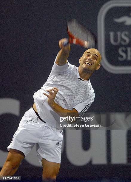 Andre Agassi during an exhibition match at the annual MusiCares fund raiser held during the Countrywide Classic at the Los Angeles Tennis Center, on...