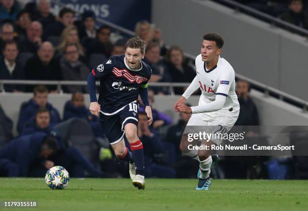 Crvena Zvezda's Marko Marin and Tottenham Hotspur's Dele Alli during the UEFA Champions League group B match between Tottenham Hotspur and Crvena...