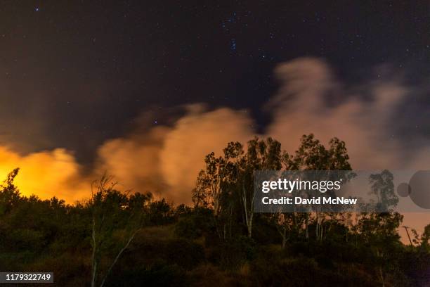 The Maria Fire burns on a hillside as it expanded to 8,000 acres on its first night on November 1, 2019 near Somis, California. Southern California...