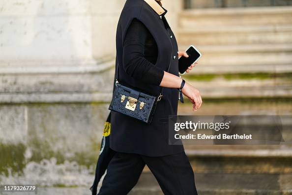 A Vuitton black Petite Malle bag is seen, outside Louis Vuitton