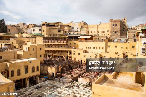 fes leather tannery, morocco, africa - fes stock-fotos und bilder