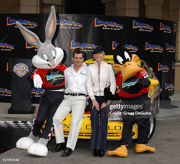 Jeff Gordon and Jenna Elfman during Jeff Gordon and Jenna Elfman Team Up to Unveil a Race Car, Pace Car and Spy Car at Warner Bros. Studios in...