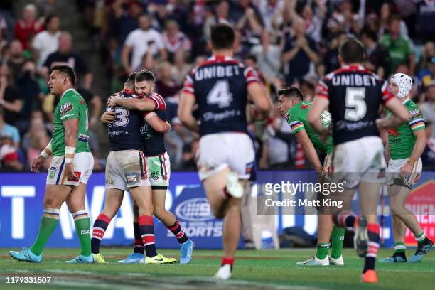 James Tedesco of the Roosters celebrates scoring a try during the 2019 NRL Grand Final match between the Canberra Raiders and the Sydney Roosters at...