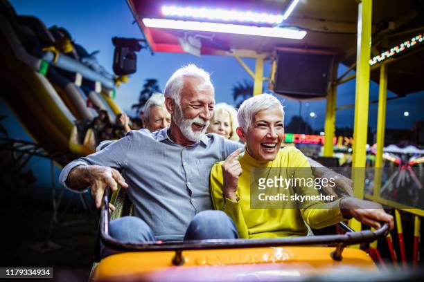 rollercoaster rida i en pensionering! - park festival bildbanksfoton och bilder