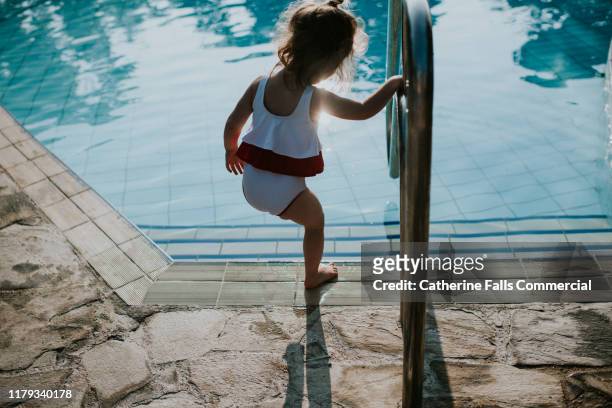 little swimmer - dip toe stock pictures, royalty-free photos & images