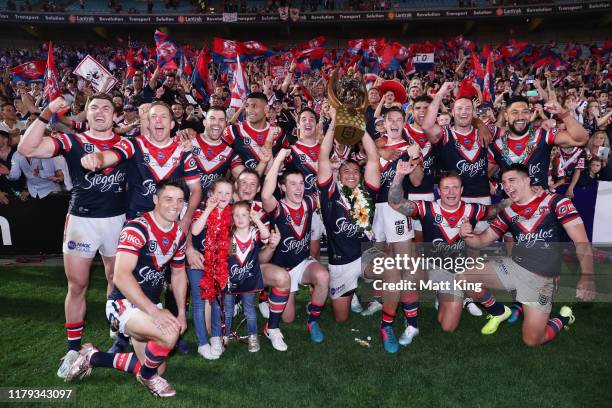 The Roosters celebrate victory with fans after the 2019 NRL Grand Final match between the Canberra Raiders and the Sydney Roosters at ANZ Stadium on...