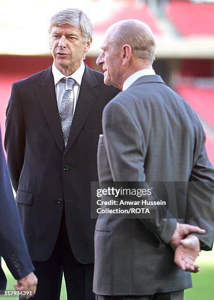 The Duke of Edinburgh chats to Arsenal manager Arsene Wenger as he officially opens the Emirates Stadium in London, 26 October 2006. HRH The Duke of...