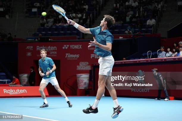 Nicolas Mahut and Edouard Roger-Vasslin of France return shot during their men's doubles final against Nikola Mektic and Franko Skugor of Croatia on...
