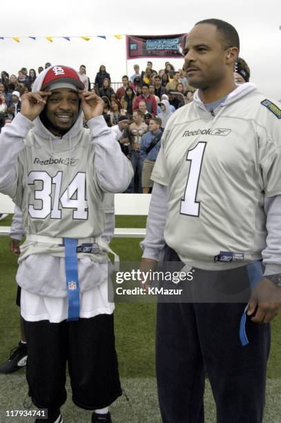 Murphy Lee and Warren Moon during MTV's Rock N Jock Super Bowl XXXVIII at MTV Compound Near Reliant Stadium in Houston, Texas, United States.