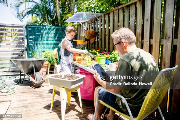 australian people engaged in everyday activities with their digital devices. - australian culture stock photos et images de collection