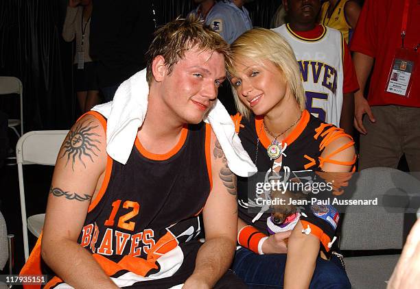 Nick Carter and Paris Hilton during 2004 NBA All-Star Celebrity Game at Los Angeles Convention Center in Los Angeles, California, United States.