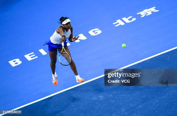 Naomi Osaka of Japan serves in the Women's Singles final match against Ashleigh Barty of Australia on Day nine of 2019 China Open at the China...