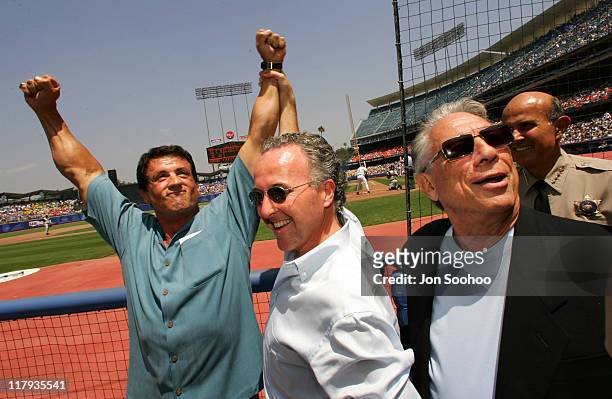 Sylvester Stallone, Frank McCourt, owner of the Los Angeles Dodgers and Donald Sterling, owner of the Los Angeles Clippers