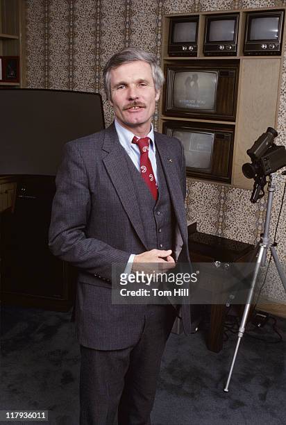 Cable television mogul Ted Turner is photographed with video display equipment in his office at Turner Broadcasting System on January 5, 1982 in...