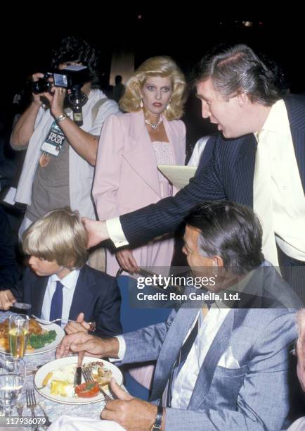 View of, from left, Donald Trump Jr , his parents Ivana Trump & Donald Trump , and Milos Zelnicek , as they attend a boxing match at Trump Plaza,...