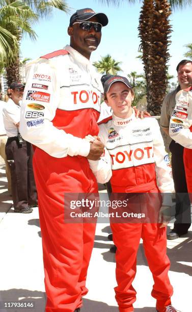 Karl Malone and Frankie Muniz during 29th Annual Toyota Pro/Celebrity Race at The Long Beach Convention Center in Long Beach, California, United...