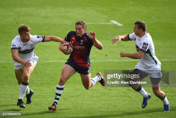 Tiff Eden of Bristol Bears attempts to get through Brendan Macken and Ollie Hassell-Collins of London Irish during the Premiership Rugby Cup Third...