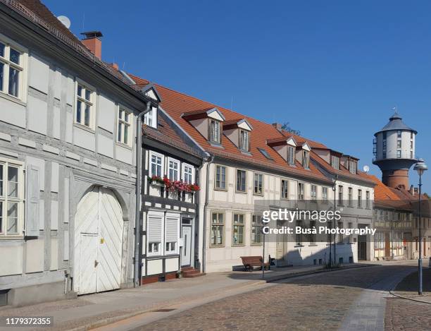 street in the town of nauen in brandenburg, germany - deutsche kultur stock-fotos und bilder