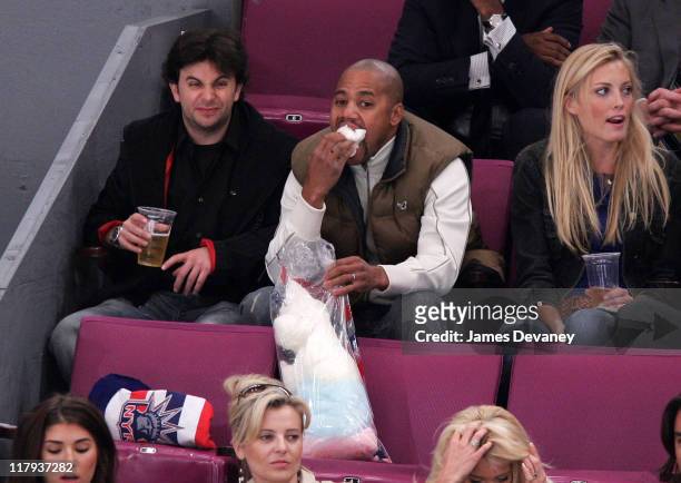 Cuba Gooding Jr and guest during Celebrities Attend Philadelphia Flyers vs New York Rangers Game - October 10, 2006 at Madison Square Garden in New...