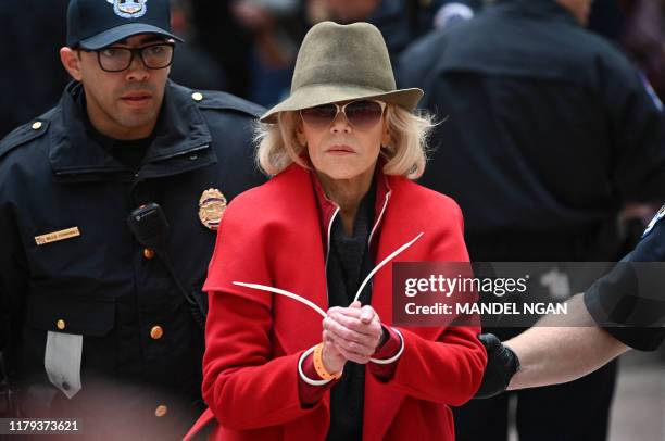 Actress and activist Jane Fonda is arrested by Capitol Police during a climate protest inside the Hart Senate office building on November 1, 2019 in...