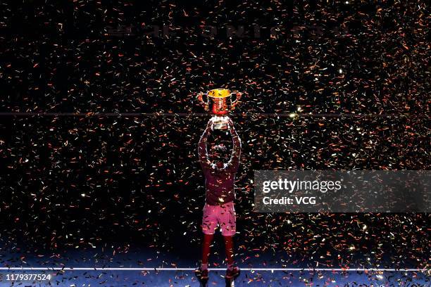 Dominic Thiem of Austria poses with the champion trophy after the Men's Singles final match against Stefanos Tsitsipas of Greece on Day nine of 2019...