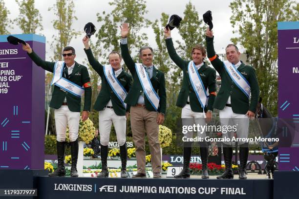 Paul O'shea, Peter Moloney, team´s manager Rodrigo Pessoa, Darragh Kenny, Cian O´Connor of Ireland celebrate during the trophy ceremony after winning...