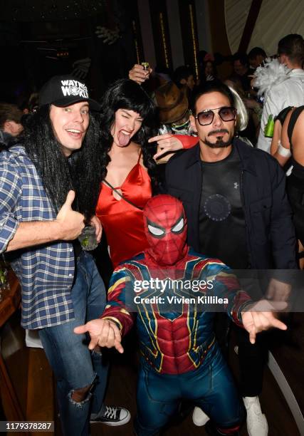 Josh Kroenke, Elizabeth Maynard and Eric Podwall attend Podwall Entertainment's 10th Annual Halloween Party presented by Maker's Mark on October 31,...