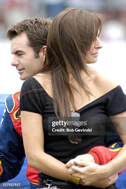 Jeff Gordon and his girlfriend Ingrid Vandebosch on pit row before the start of the New England 300 NASCAR NEXTEL Cup Series race at New Hampshire...