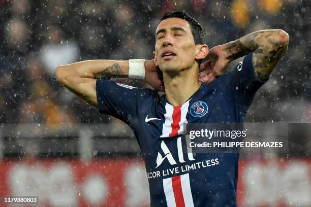 Paris Saint-Germain's Argentine midfielder Angel Di Maria reacts during the French L1 football match between Dijon Football Cote-d'Or and Paris...