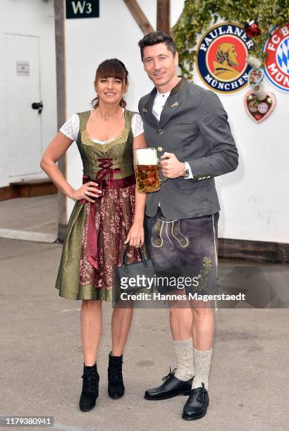 Robert Lewandowski of FC Bayern Muenchen and his wife Anna Lewandowska attend the Oktoberfest at Kaefer Wiesenschaenke tent at Theresienwiese on...
