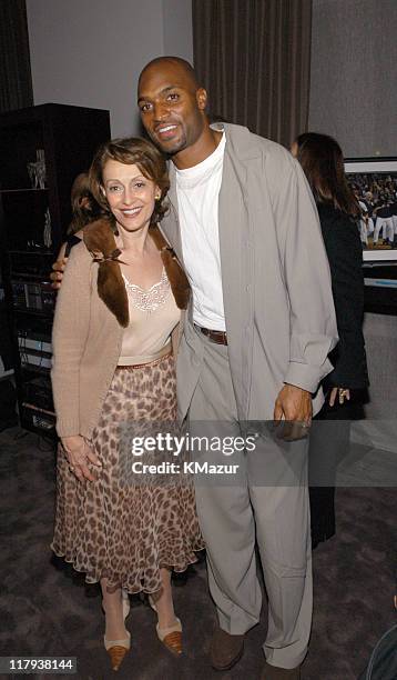 Evelyn Lauder and Amani Toomer of the NY Giants during "New York Sports Night" at the Esquire Apartment at The Esquire Apartment in New York City,...