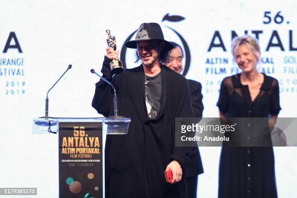 Director Joe Odagiri speaks after receiving the Best Movie Award at the awards ceremony of the 56th Antalya Golden Orange Film Festival in Antalya,...