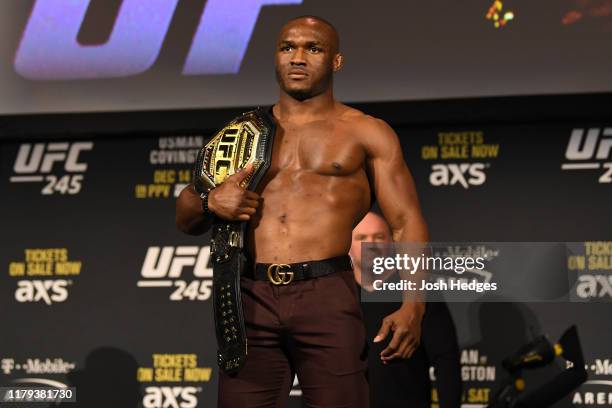 Welterweight champion Kamaru Usman poses on stage during the UFC 245 press conference at the Hulu Theatre at Madison Square Garden on November 1,...