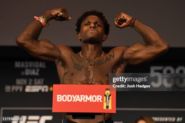 Hakeem Dawodu of Canada poses on the scale during the UFC 244 weigh-ins at the Hulu Theatre at Madison Square Garden on November 1, 2019 in New York,...