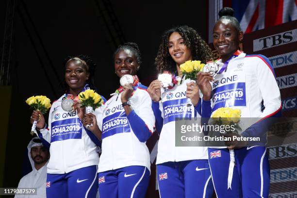 Asha Philip, Dina Asher-Smith, Ashleigh Nelson and Daryll Neita of Great Britain, silver, pose during the medal ceremony for the Women's 4x100 Metres...
